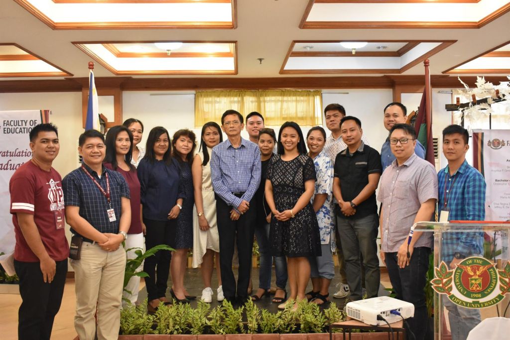 Newly appointed FEd Faculty Office Alumni Chapter Officers with Dean Bagarinao (second from the left) and UPOU AFI representatives (first from the left and from the right).